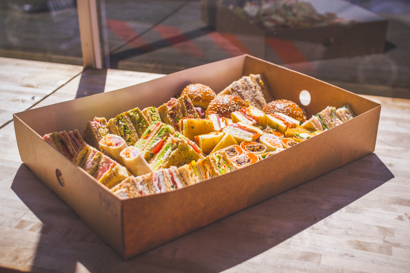 Kraft board platter box consisting of outer window box and a crash-lock inner drawer. Perfect for outside catering and events. Inserts are available to divide into smaller sections. Has a generous window for great presentation. 'Large' is twice the size of our 'regular' platter box.