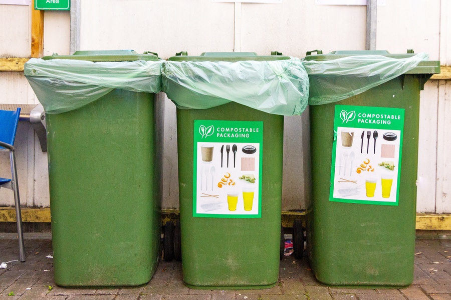 Three bins in a row for Vegware and food waste composting collections