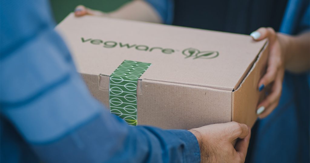 A Vegware package being delivered